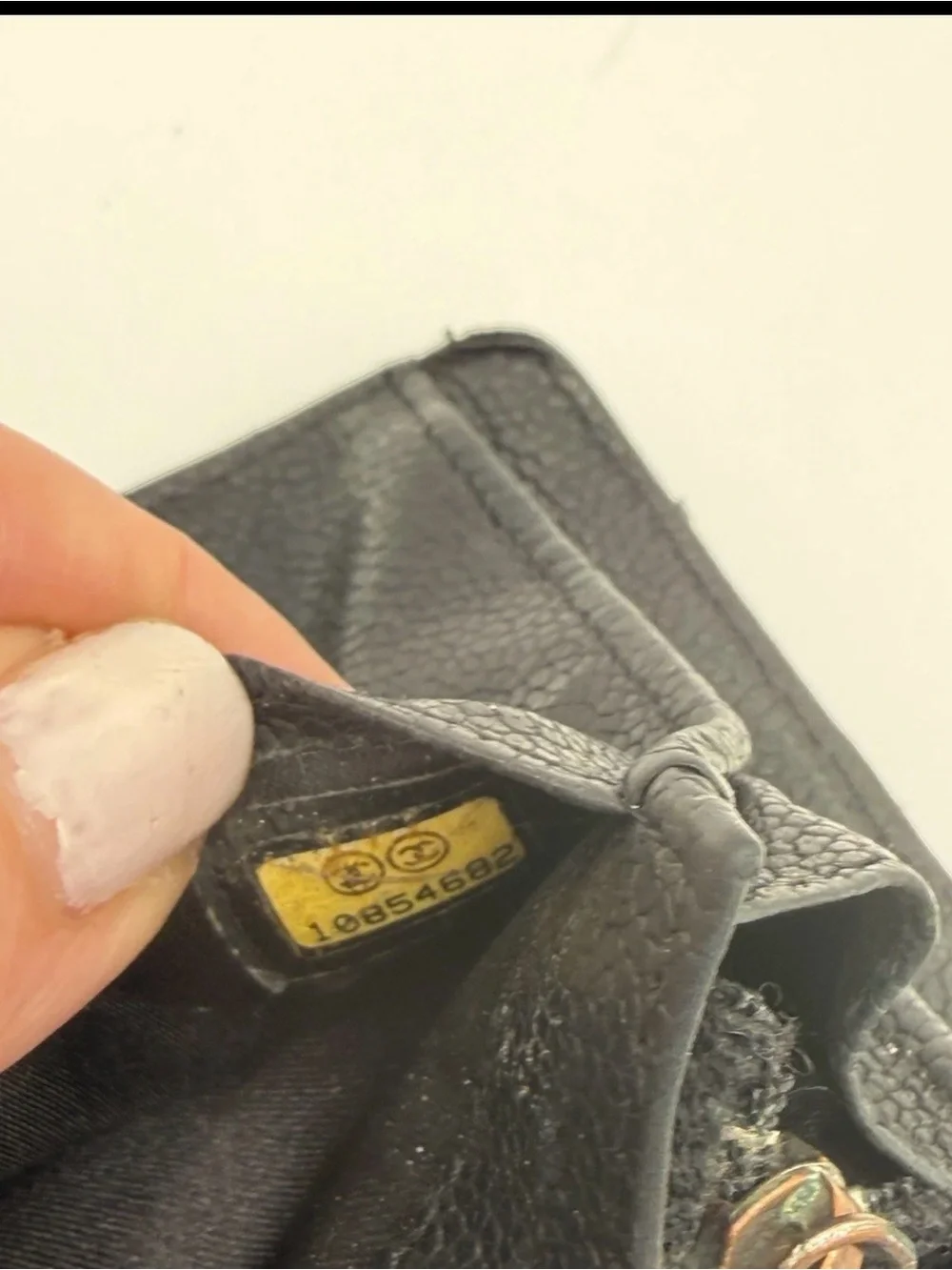CHANEL Black Quilted Caviar Leather Wallet with Silver CC Emblem